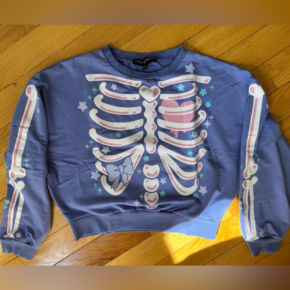 Trickz n’ Treatz Rattle My Bones Light Purple Skeleton Graphic Sweatshirt